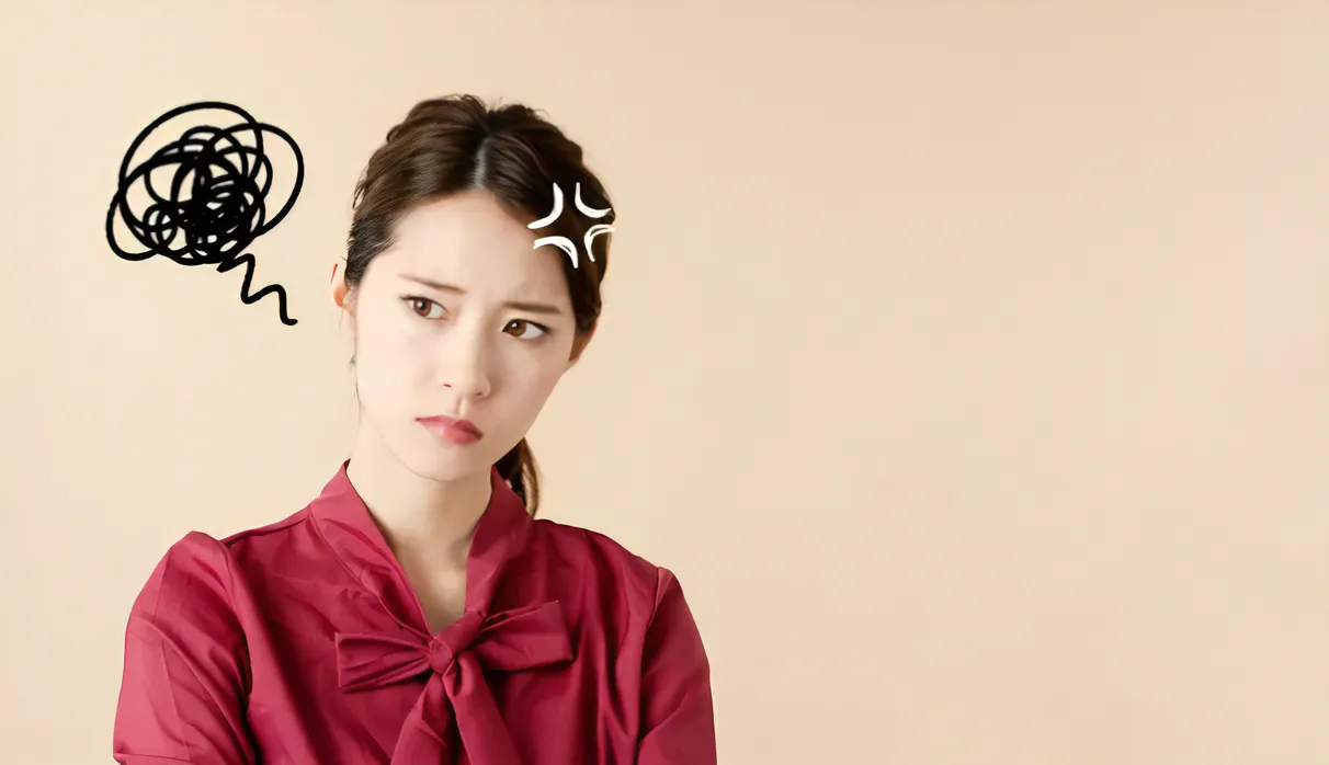 怒る女性